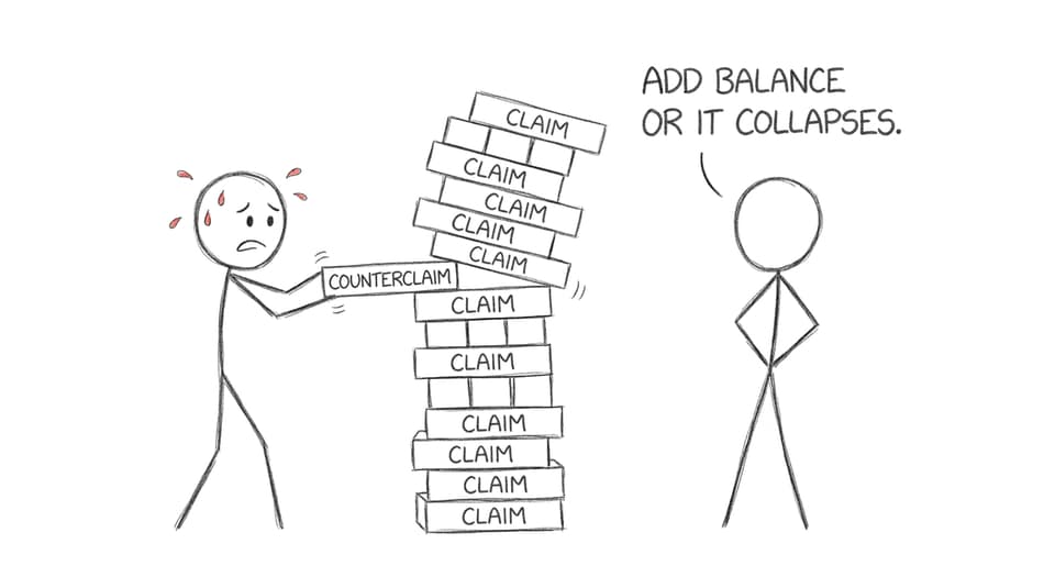 Student balancing claim and counterclaim Jenga tower