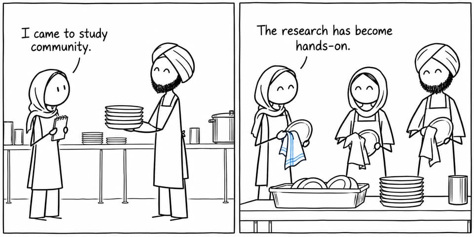 A student who came to study community ends up drying dishes with volunteers in a communal kitchen