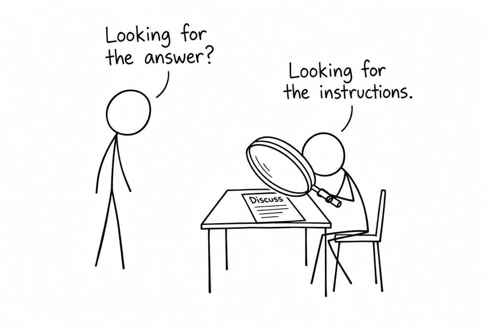 A student uses an enormous magnifying glass to inspect the word Discuss while another student asks whether they are looking for the answer.